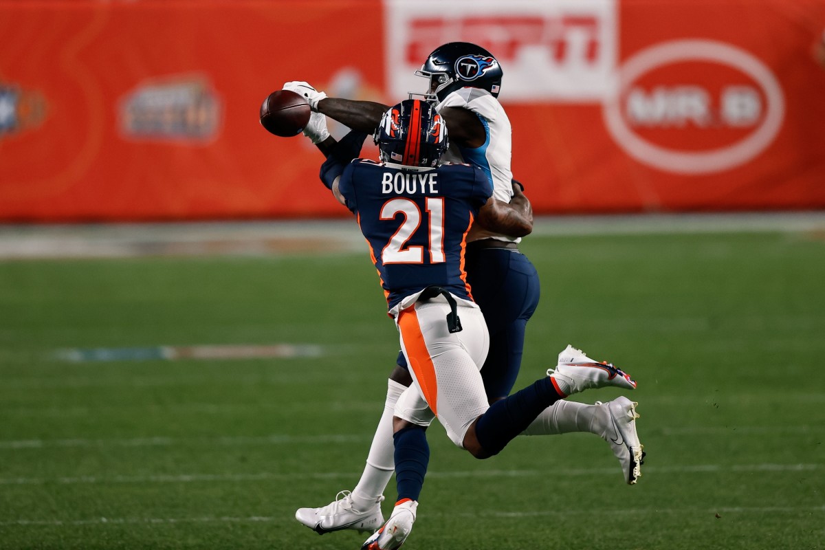 Sep 14, 2020; Denver Broncos cornerback A.J. Bouye (21) breaks up a pass intended for Titans receiver A.J. Brown (11). Mandatory Credit: Isaiah J. Downing-USA TODAY